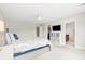 Spacious main bedroom features neutral paint, ceiling fan, walk-in closet, and en suite bathroom at 3010 Grinnell St, Johns Island, SC 29455
