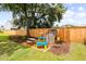 Backyard play area featuring a playset and picnic table, ideal for activities and outdoor fun at 3010 Grinnell St, Johns Island, SC 29455