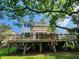 Multi-level back deck with pergola and lots of seating at 324 Wild Horse Ln, Mount Pleasant, SC 29464