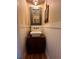 Charming powder room features a vessel sink and attractive wall paneling at 324 Wild Horse Ln, Mount Pleasant, SC 29464