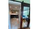 Bathroom view showcases modern vanity with double sinks and a glimpse of a sunroom at 324 Wild Horse Ln, Mount Pleasant, SC 29464