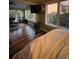 Bedroom with marsh views, an ensuite seating area and ample natural light at 324 Wild Horse Ln, Mount Pleasant, SC 29464