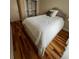 Comfortable bedroom with a tufted headboard and built in closet at 324 Wild Horse Ln, Mount Pleasant, SC 29464