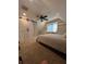 Bedroom with built in storage and shelving, and a ceiling fan at 324 Wild Horse Ln, Mount Pleasant, SC 29464