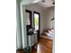 Entryway with hardwood floors, shiplap walls, decorative furniture and staircase at 324 Wild Horse Ln, Mount Pleasant, SC 29464