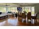 Spacious living room boasts a dining area, with plenty of natural light at 324 Wild Horse Ln, Mount Pleasant, SC 29464