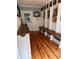 Mudroom with pine floors, built-in storage cubbies, and a long bench at 324 Wild Horse Ln, Mount Pleasant, SC 29464