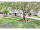 Beautiful home with a green lawn, mature trees, and a welcoming front entrance at 350 Arlington Dr, Charleston, SC 29414
