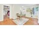 Hallway nook with an antique desk, chair, and view to the kitchen at 350 Arlington Dr, Charleston, SC 29414
