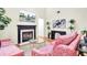 Cozy living room features a fireplace, modern decor, and ample natural light at 350 Arlington Dr, Charleston, SC 29414