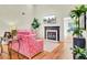 Bright living room features a fireplace, modern decor, and ample natural light at 350 Arlington Dr, Charleston, SC 29414