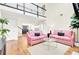 Open living room with high ceilings, a cozy seating area, and natural light at 350 Arlington Dr, Charleston, SC 29414