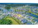 Aerial view showcasing a neighborhood bordering a winding waterway with many single Gathering homes at 366 Tupelo Lake Dr, Summerville, SC 29486