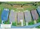 Aerial view of the property highlighting lot lines within this residential neighborhood and landscaped yards at 366 Tupelo Lake Dr, Summerville, SC 29486