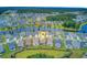 Community aerial view showcasing pond, central park, single Gathering homes with pinpoint highlighting listing at 366 Tupelo Lake Dr, Summerville, SC 29486