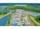 Aerial view of homes and neighborhood bordering a winding waterway, highlighted by a central pinpoint at 366 Tupelo Lake Dr, Summerville, SC 29486