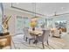 Open dining area offers access to the backyard and is adjacent to the living room at 366 Tupelo Lake Dr, Summerville, SC 29486
