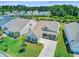 Well-maintained home with manicured lawn and flower beds offers a cozy and inviting curb appeal at 366 Tupelo Lake Dr, Summerville, SC 29486