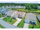 Lovely home with green lawn, mature trees, and attractive landscaping offers a comfortable suburban lifestyle at 366 Tupelo Lake Dr, Summerville, SC 29486