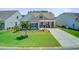 Beautiful single-story home featuring a lush lawn and charming front porch at 366 Tupelo Lake Dr, Summerville, SC 29486