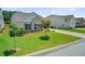 Lovely single-story home with spacious lawn and mature landscaping at 366 Tupelo Lake Dr, Summerville, SC 29486