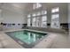 Indoor hot tub spa area with large windows for natural light and relaxation at 366 Tupelo Lake Dr, Summerville, SC 29486