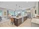 Open-concept kitchen featuring a large island, stainless steel appliances, and bar seating at 366 Tupelo Lake Dr, Summerville, SC 29486