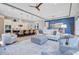 Open living space with a modern kitchen, eat-in island, and inviting living room with hardwood flooring at 366 Tupelo Lake Dr, Summerville, SC 29486