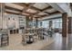 Stylish lounge with wooden beams, modern furniture, TV, and a beautiful view of the outside at 366 Tupelo Lake Dr, Summerville, SC 29486