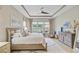 Bright main bedroom boasting hardwood floors, backyard views, and decorative window coverings at 366 Tupelo Lake Dr, Summerville, SC 29486