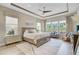 Tranquil main bedroom features hardwood floors, lots of natural light, and decorative tray ceiling at 366 Tupelo Lake Dr, Summerville, SC 29486