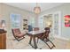Comfortable home office featuring a desk, leather chairs, and ample natural light at 366 Tupelo Lake Dr, Summerville, SC 29486