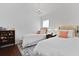 Cozy bedroom featuring two twin beds, soft lighting, and comfortable decor at 3998 Capensis Ln, Ravenel, SC 29470