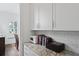 Bright kitchen with granite countertops, white subway tile backsplash, and modern appliances at 3998 Capensis Ln, Ravenel, SC 29470