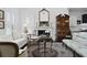 Classic living room features a fireplace, white sofa, and elegant decor at 3998 Capensis Ln, Ravenel, SC 29470