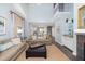 Open living room with view to dining area and a wet bar for entertaining at 410 Yacht Harbor Ct # 410, Isle of Palms, SC 29451