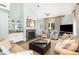Bright living room with fireplace, plush seating, and a large window at 410 Yacht Harbor Ct # 410, Isle of Palms, SC 29451