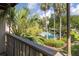 Scenic view of a community pool surrounded by lush tropical landscaping at 410 Yacht Harbor Ct # 410, Isle of Palms, SC 29451