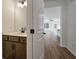 Bathroom featuring a modern vanity and mirror, with a view to the living room at 420 Duskywing Dr, Goose Creek, SC 29445