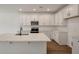 Modern kitchen with a center island, stainless steel appliances, and plenty of cabinet space at 420 Duskywing Dr, Goose Creek, SC 29445