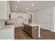 Bright kitchen featuring white cabinets, quartz counters, stainless appliances, and center island at 420 Duskywing Dr, Goose Creek, SC 29445