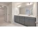 Bathroom featuring double vanity with grey cabinets and marble floors at 422 Duskywing Dr, Goose Creek, SC 29445
