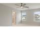 Bedroom with neutral carpet, ceiling fan, and two windows providing natural light at 422 Duskywing Dr, Goose Creek, SC 29445