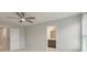 Neutral bedroom featuring ceiling fan, carpet, and ensuite bath with double sink vanity at 422 Duskywing Dr, Goose Creek, SC 29445