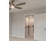 Open bedroom view reveals a modern ceiling fan and stairway to the next level at 422 Duskywing Dr, Goose Creek, SC 29445