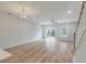 The bright and open living room showcases hardwood floors, recessed lighting, and access to the backyard at 422 Duskywing Dr, Goose Creek, SC 29445