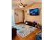 Living room featuring hardwood floors, a ceiling fan, TV and large accent rug at 429 Stephanie Dr, Goose Creek, SC 29445