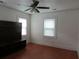 Bedroom featuring hardwood floors, blinds, and white walls at 47 Oswego St, Charleston, SC 29403