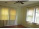 Bright bedroom featuring hardwood floors and natural light at 47 Oswego St, Charleston, SC 29403