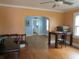 Spacious living room with hardwood floors, arched doorway, and ceiling fan at 47 Oswego St, Charleston, SC 29403